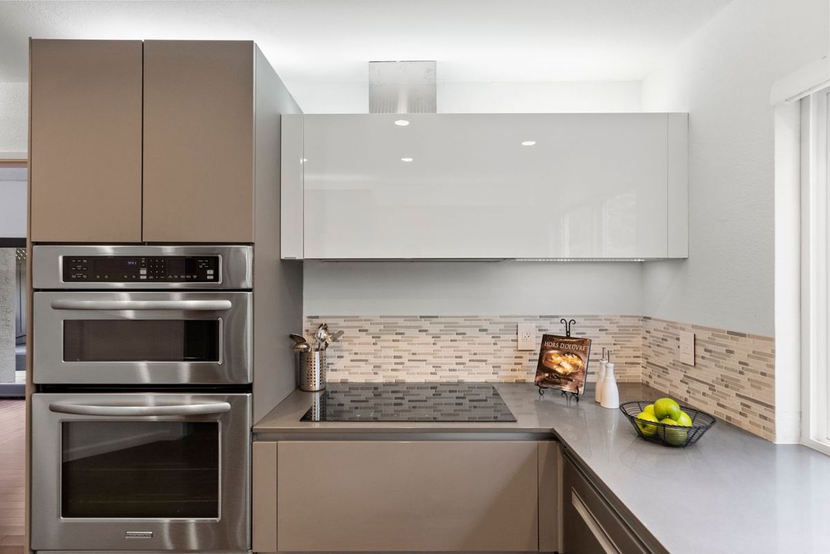 Bright kitchen with built-in ovens and a cooktop